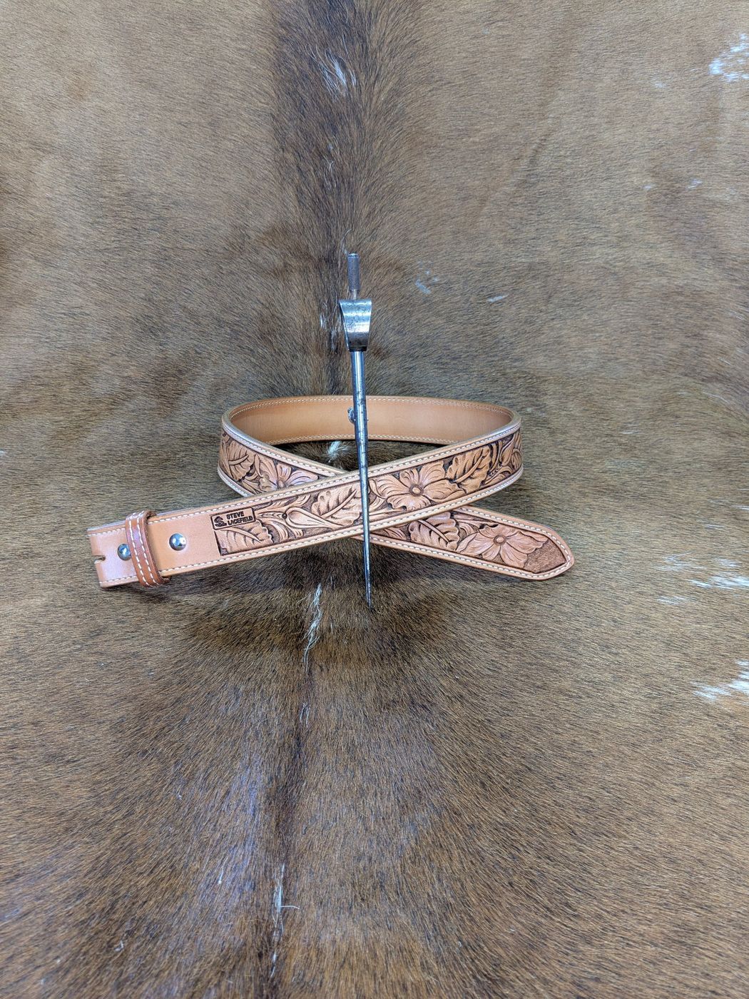 Floral carved natural leather belt on cowhide