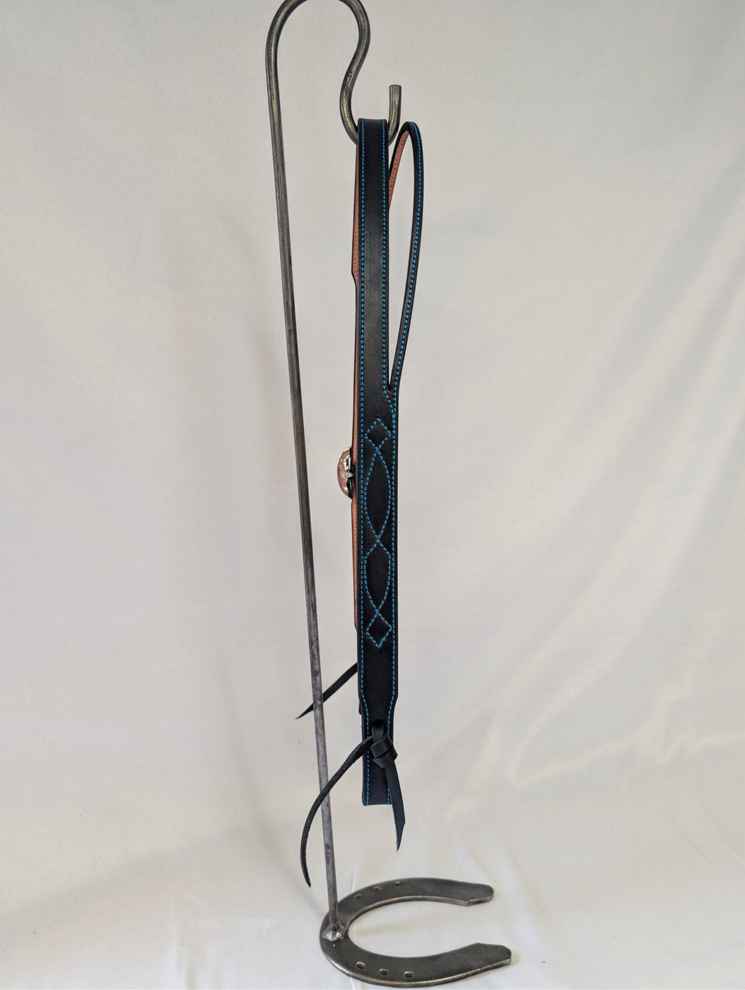 Black leather headstall with turquoise stitching, back view