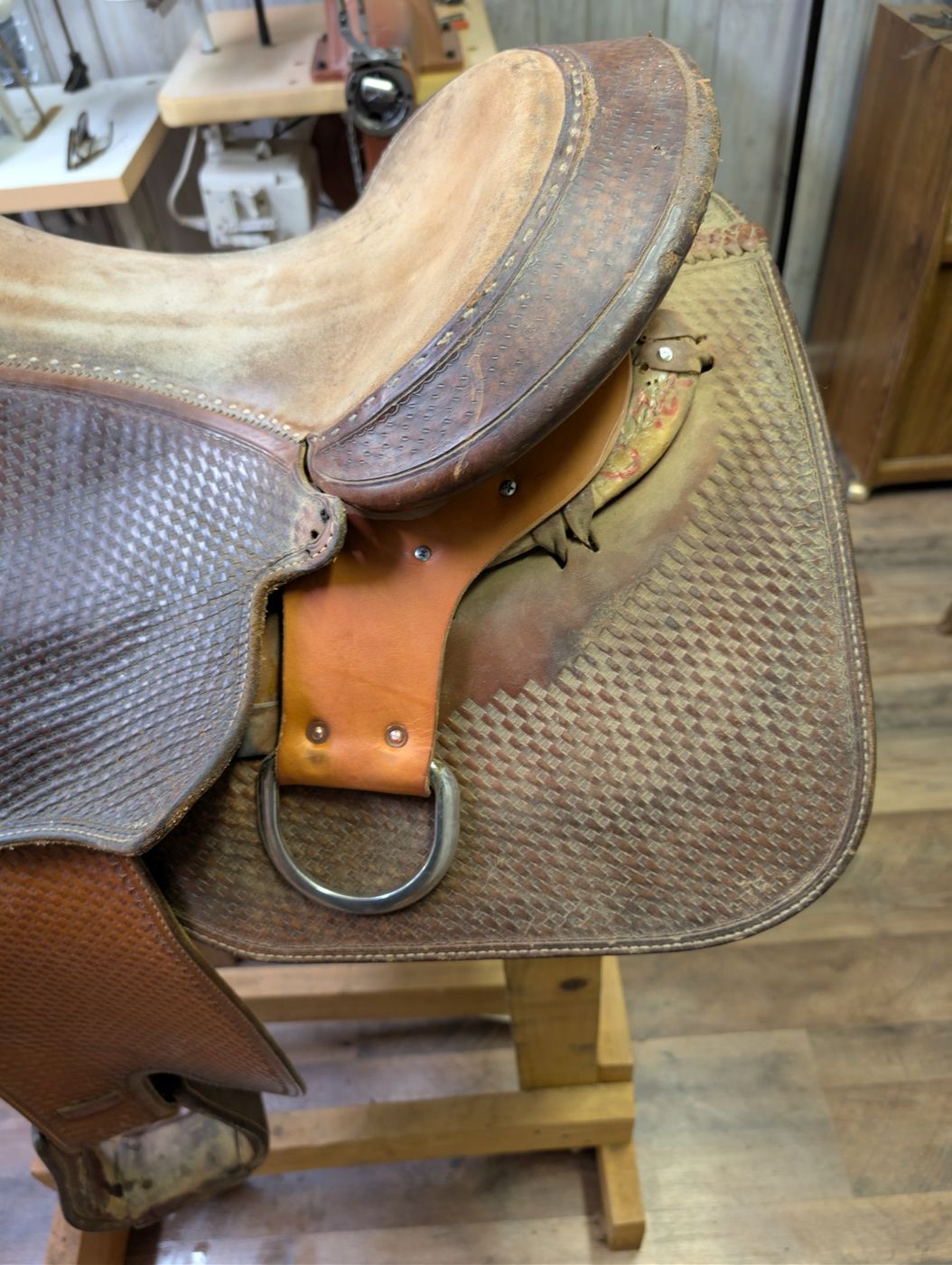 Western saddle with basket-stamp tooling and roughout seat